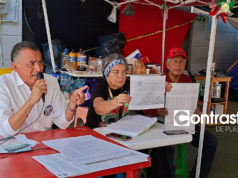 Denuncian irregularidades en consulta salarial del IMSS en Puebla